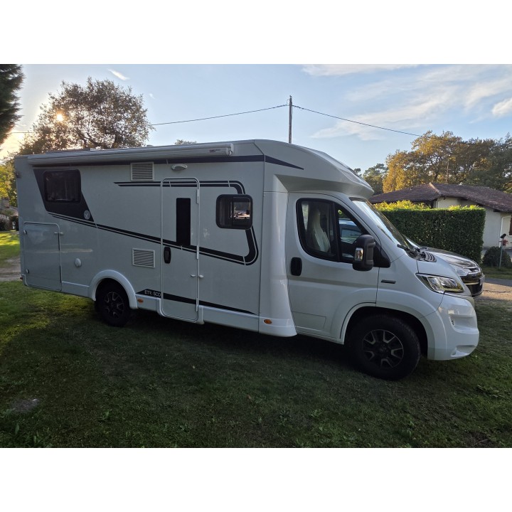 Camping-car profilé d'occasion Etrusco T7400SBC 7.40m TV ant sat store + options état neuf garantie 12 mois
